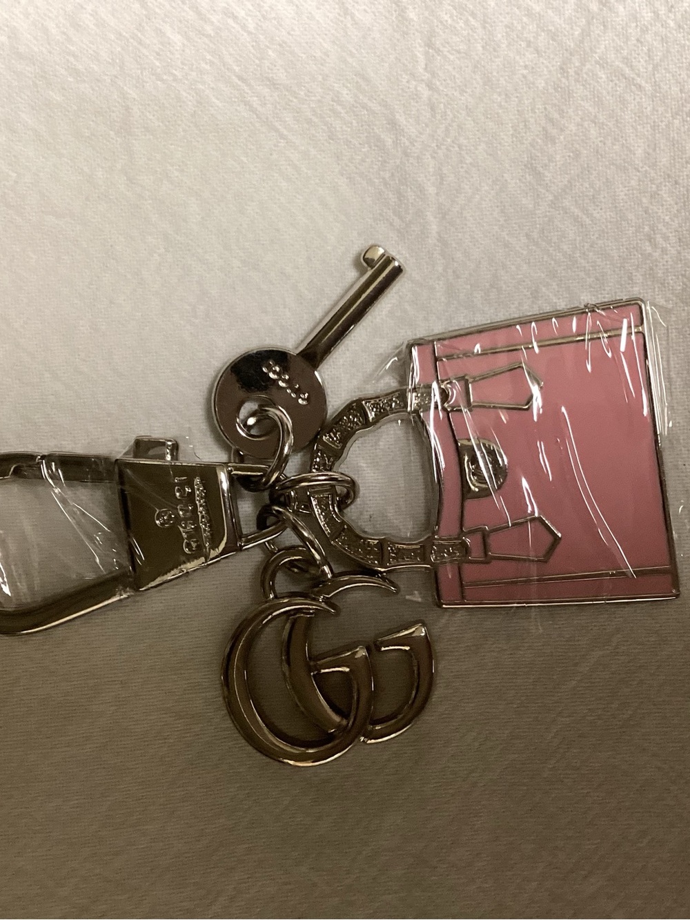 Gucci Silver-Tone Keychain with Pink Enamel Handbag Charm
